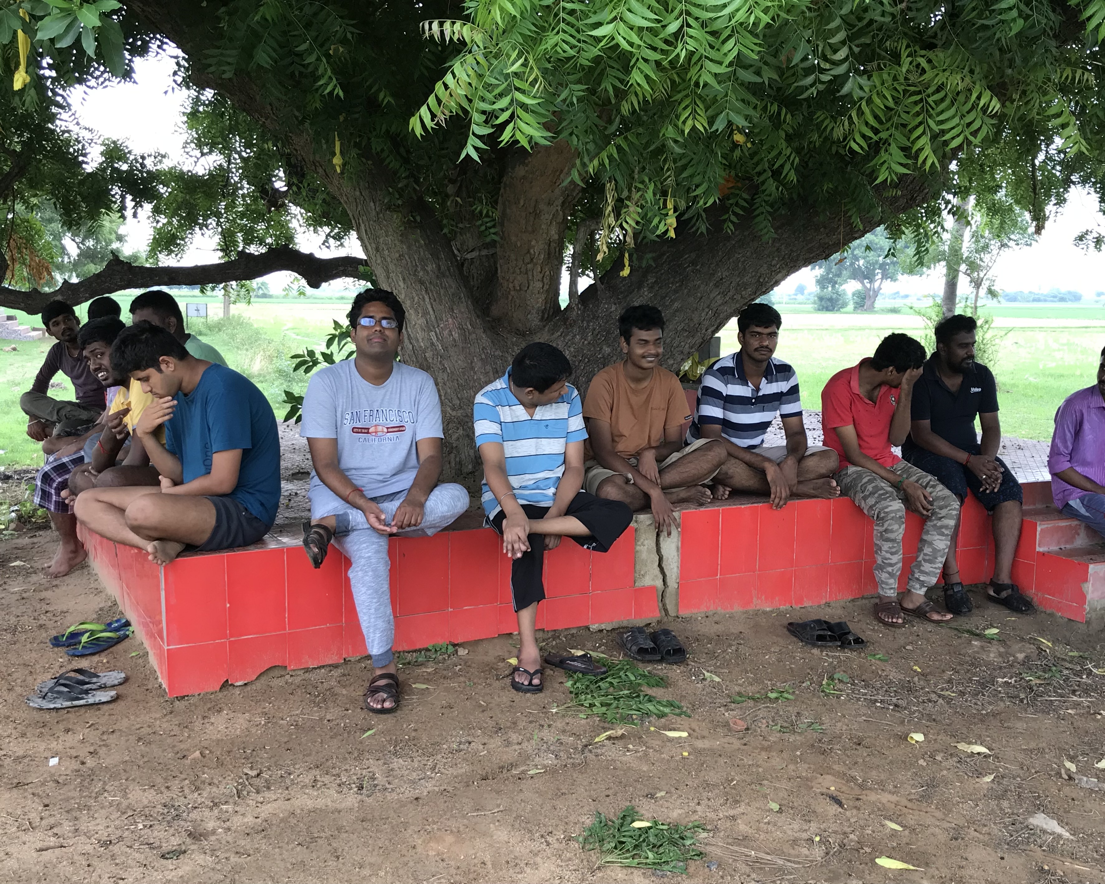 Medical camp with doctors attending patients, part of Sreyes Arogya program